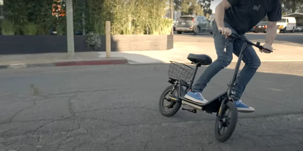 Man enjoying riding electric scooter